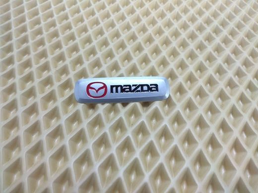 Шильдик (емблема) для килимків Mazda