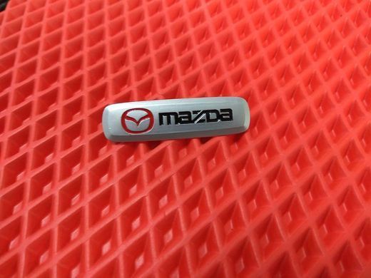 Шильдик (эмблема) для ковриков Mazda, AVTM LGEV10267
