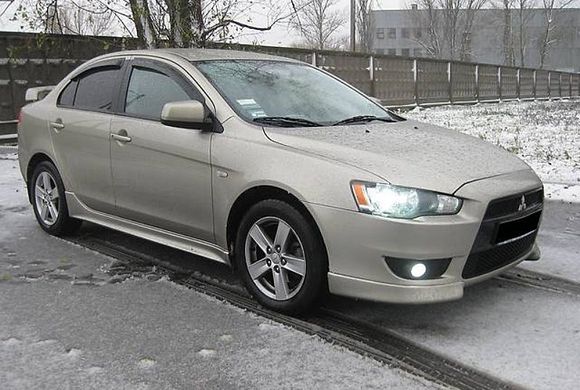 Дефлектори вікон (вітровики) Mitsubishi Lancer 2007- SMILAN0732 SIM